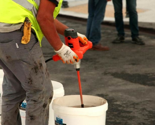 workers repairing concrete