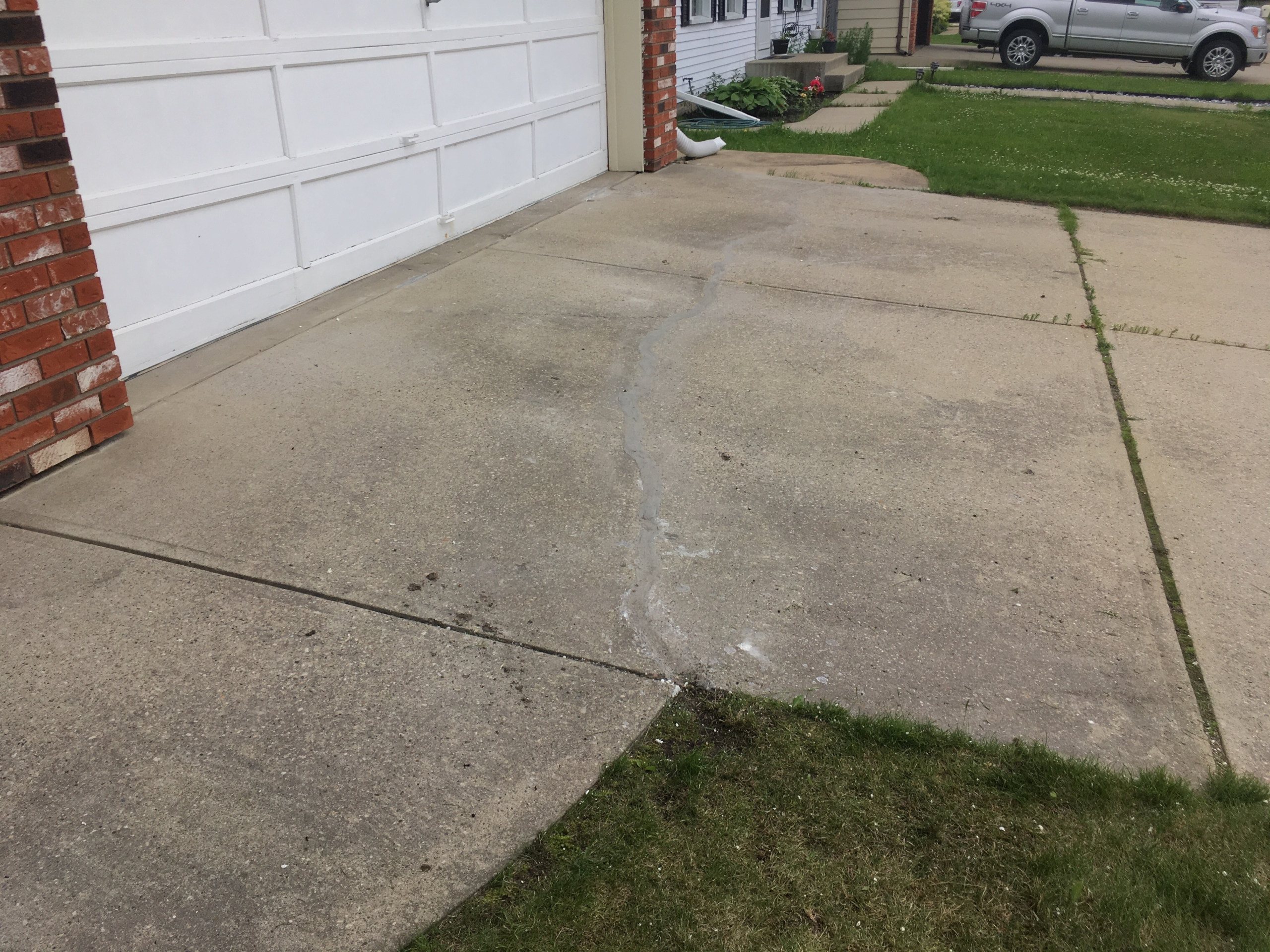 Driveway after concrete lifting and crack repair